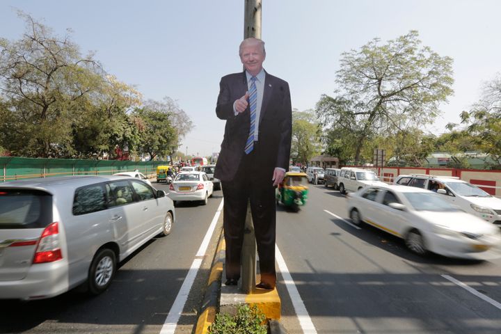 A life size cut-out of U.S. president Donald Trump on a road divider, ahead of his visit in Ahmedabad, India, Saturday, February 22, 2020.