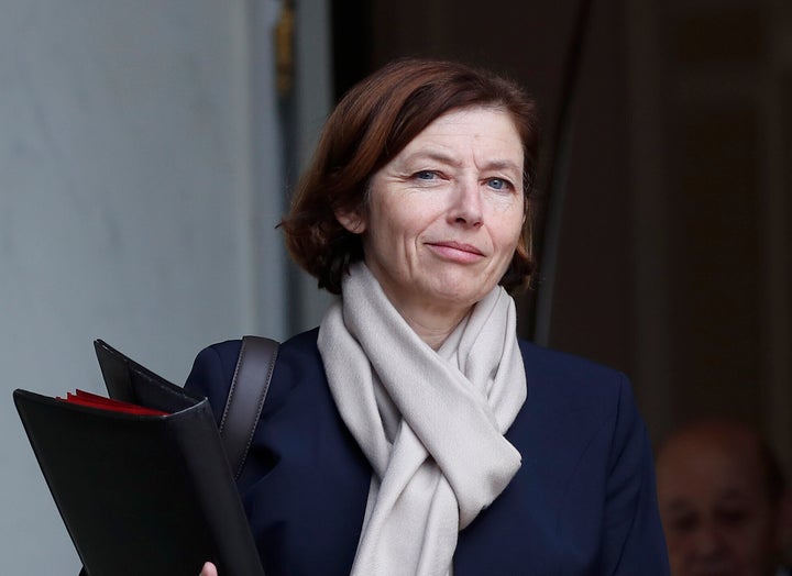 French Defense Minister Florence Parly walks out after the weekly cabinet meeting at the Elysee Palace, in Paris, Wednesday, Feb. 19, 2020. (AP Photo/Francois Mori)