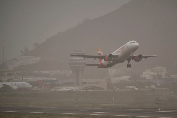 A passenger plane finally takes off from the Santa Cruz de Tenerife airport on Monday morning.