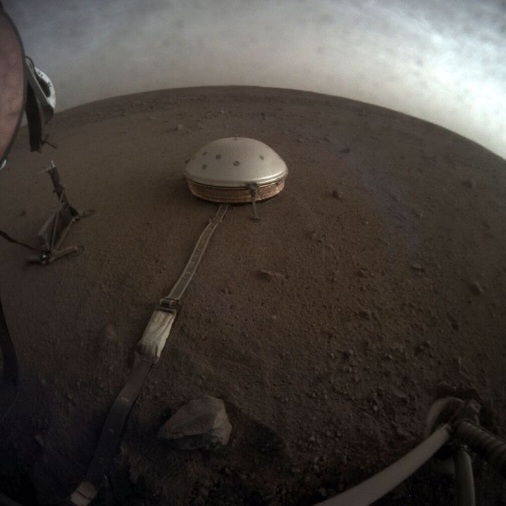 This April 25, 2019 photo made available by NASA shows the InSight lander's dome-covered seismometer, known as SEIS, on Mars. On Tuesday, Oct. 1, 2019, scientists released an audio sampling of marsquakes and other sounds recorded by the probe. (NASA/JPL-Caltech via AP)