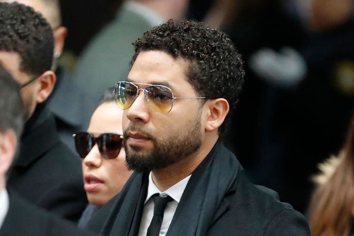 Former "Empire" actor Jussie Smollett, center, arrives for an initial court appearance Monday, Feb. 24, 2020, at the Leighton Criminal Courthouse in Chicago.