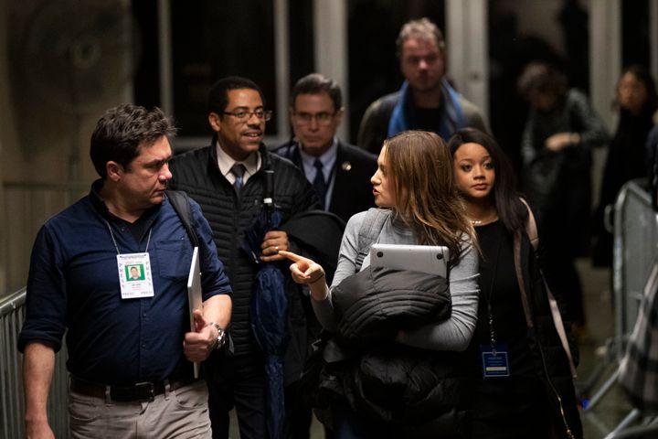 Variety reporter Elizabeth Wagmeister, right, and ABC news reporter Chris Franscescani leave the courtroom for the day during Harvey Weinstein's rape trial, Thursday, Feb. 13, 2020, in New York. 