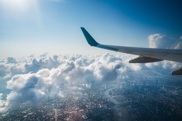 Aerial view from a flying plane in the sky over Ho Chi Minh City, Vietnam