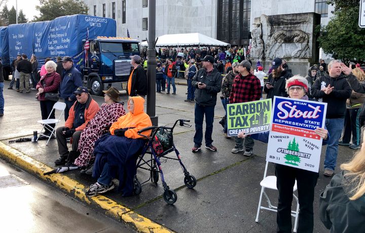 Demonstrators protest against a cap-and-trade bill aimed at stemming global warming at the Oregon State Capitol in Salem on Feb. 6, 2020.
