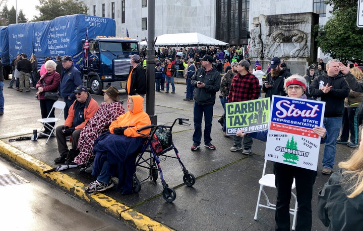 Demonstrators protest against a cap-and-trade bill aimed at stemming global warming at the Oregon State Capitol in Salem on F