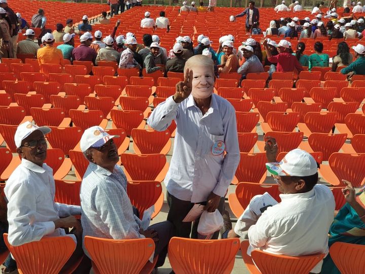 A man wearing a Trump mask at Motera Stadium in Ahmedabad.