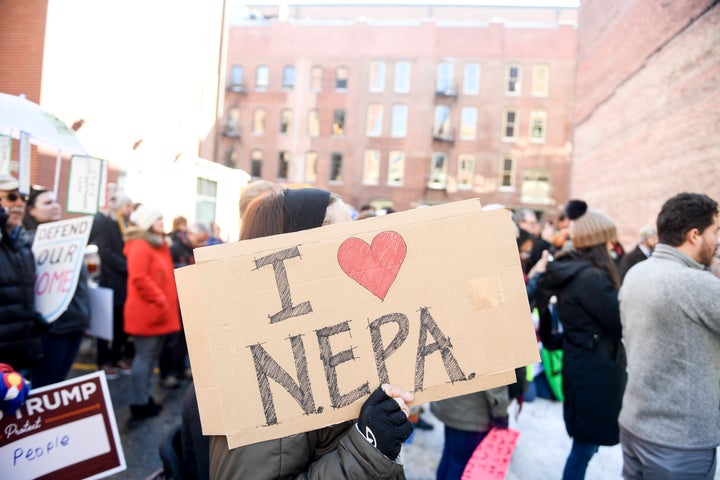 Activists gathered outside a Feb. 11 public hearing in Denver on the Trump administration's proposed update to the National Environmental Policy Act. The second and final public hearing on the proposal was held Tuesday in Washington.