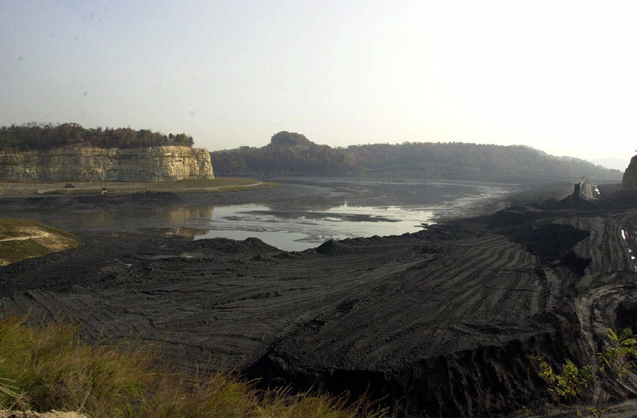 The remains of a Martin County coal sediment pond that collapsed near Inez is seen on Oct. 23, 2000. The release turned sections of the Tug Fork and Big Sandy rivers black and forced officials to seek alternative sources of water for thousands of residents.