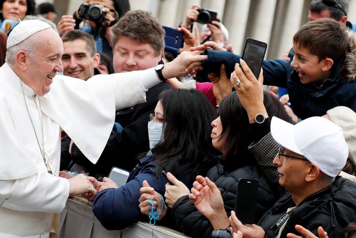 Pope Francis greets Catholic pilgrims during his weekly general audience at the Vatican on Feb. 26, 2020.