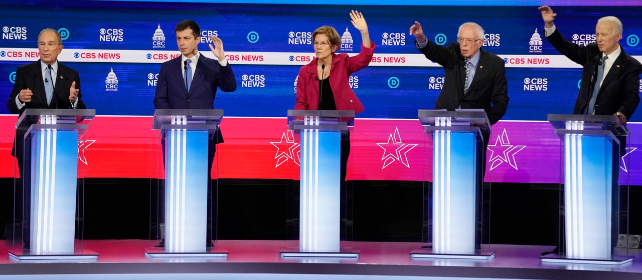 Democratic 2020 U.S. presidential candidates former New York Mayor Mike Bloomberg, former South Bend Mayor Pete Buttigieg, Senator Elizabeth Warren, Senator Bernie Sanders and former Vice President Joe Biden discuss an issue during the 10th Democratic 2020 presidential debate at the Gaillard Center in Charleston, South Carolina, on Feb. 25, 2020.