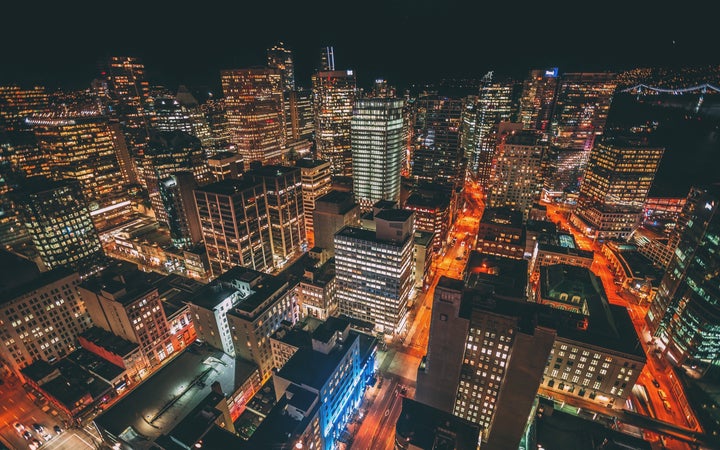 A nighttime aerial view of downtown Vancouver is seen in this stock photo.