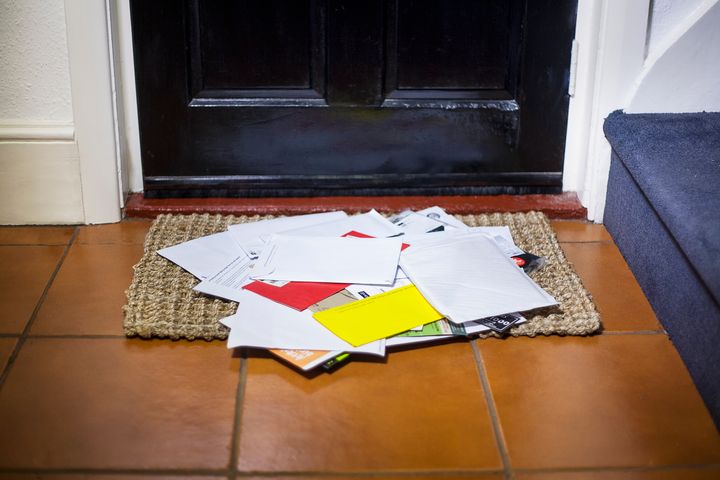 Pile of mail on doormat