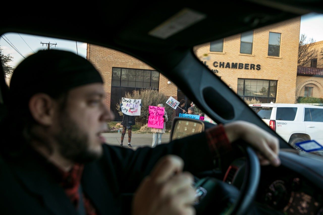 Mark Lee Dickson drives by a group of people protesting the proposed abortion ban. 