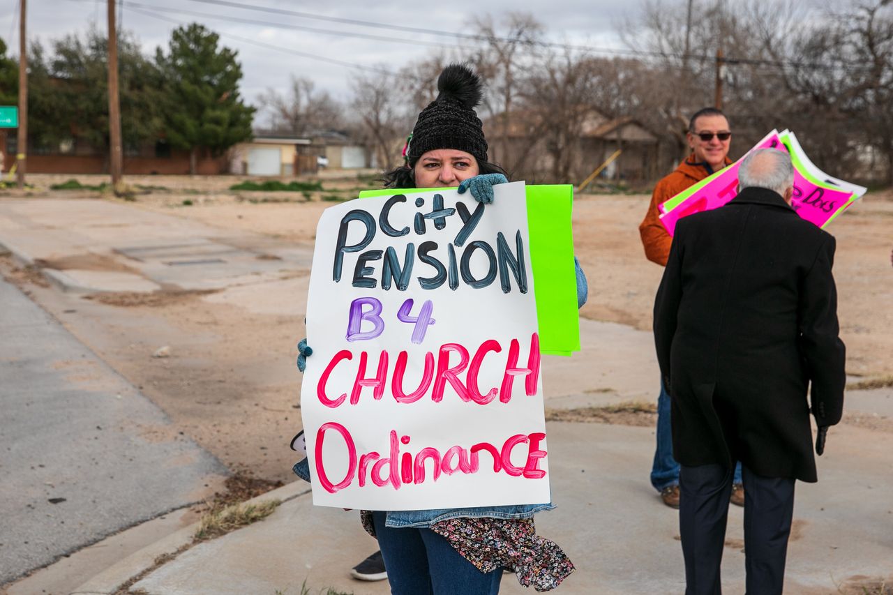 Stephanie Vela Anderson leads a small protest in Big Spring. "Growing up here, I have no patience for people who want to dictate the choices of others," she said. 