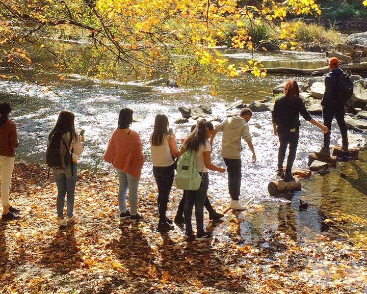 Kids explore the banks of the Delaware River as part of The Sierra Club's Outdoors for All campaign.