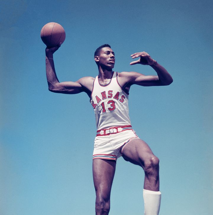 Basketball player Wilt Chamberlain poses for a portrait circa 1957 in Lawrence, Kansas.