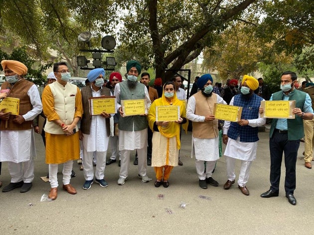 MLAs of AAP Punjab wearing masks at the Punjab Vidhan Sabha on Friday. Taking a jibe at Punjab Chief...