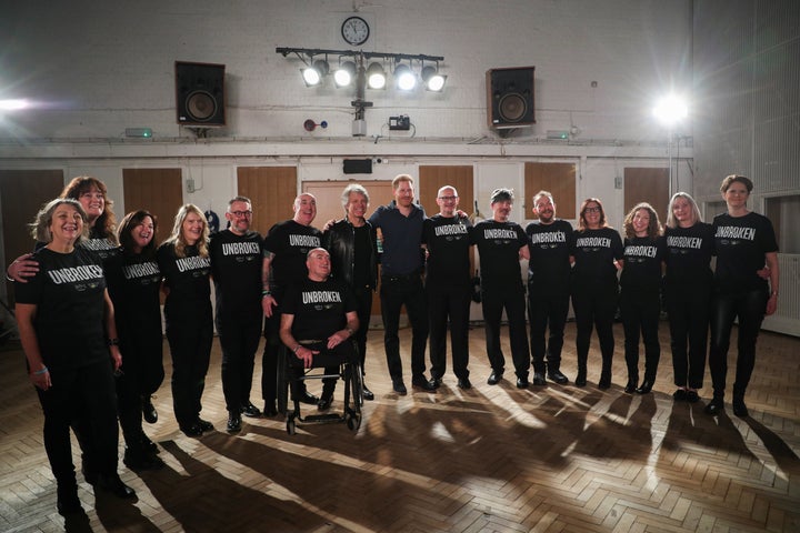 Prince Harry and Bon Jovi pose with the Invictus Games Choir.