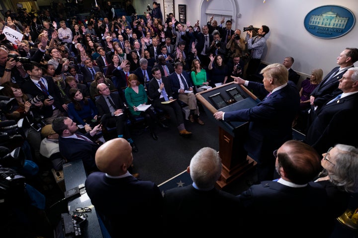 President Donald Trump, with members of the president's coronavirus task force, speaks during a news conference in the Brady Press Briefing Room of the White House, Wednesday, Feb. 26, 2020, in Washington.