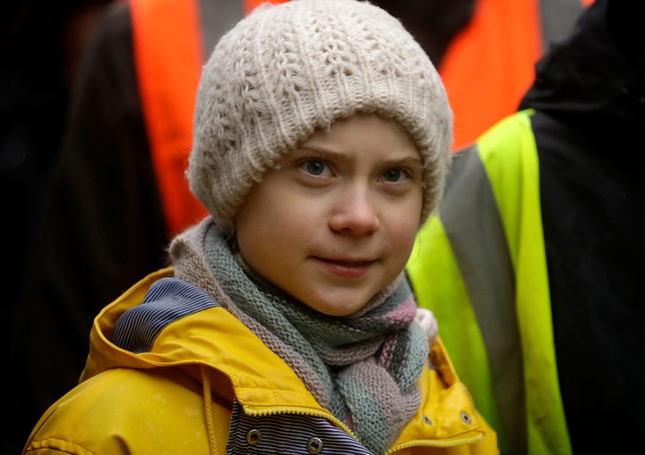 Climate activist Greta Thunberg marches in a school strike climate protest in Bristol in southwest England on Feb. 28, 2020.