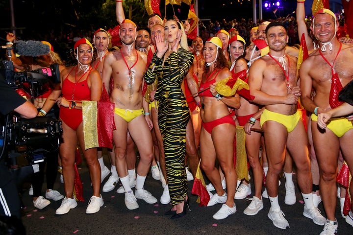 Dua Lipa poses amongst life guards during the 2020 Sydney Gay & Lesbian Mardi Gras Parade on February 29, 2020 in Sydney, Australia.