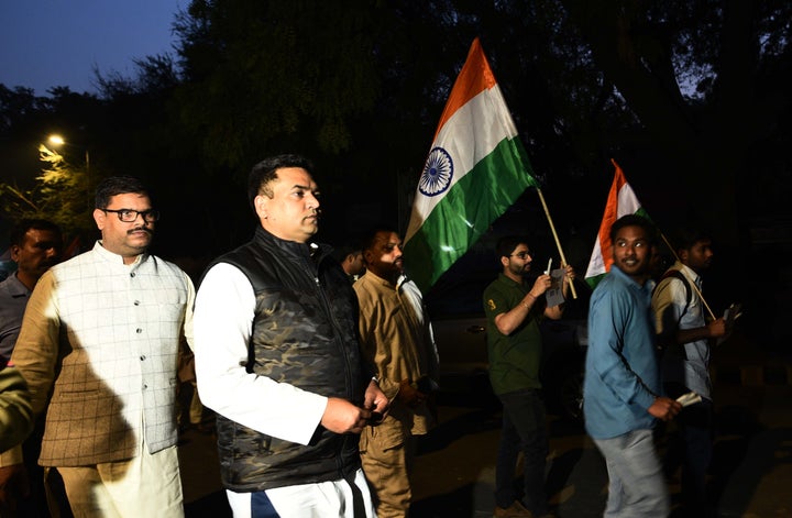 BJP leader Kapil Mishra takes part in a march to pay tribute to IB officer Ankit Sharma and Delhi Police constable Rattan Lal on February 27, 2020 in New Delhi.