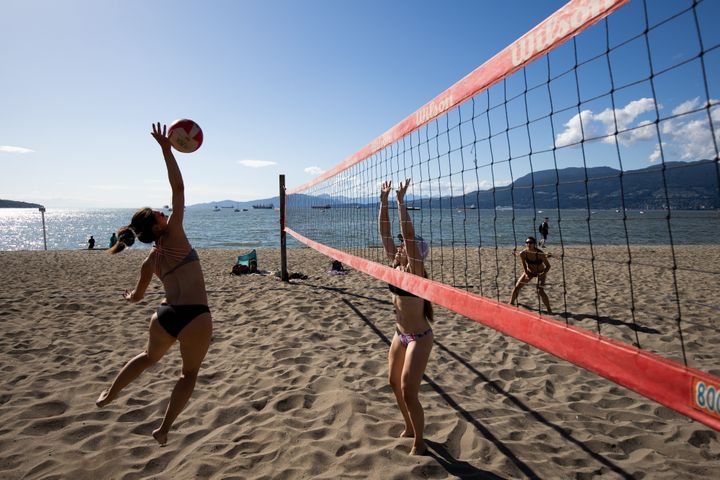 People play volleyball at Vancouver's Kitsilano Beach in this undated photo. Many sandy shorelines, particularly in densely populated areas, could be lost by 2100 because of rising sea levels.