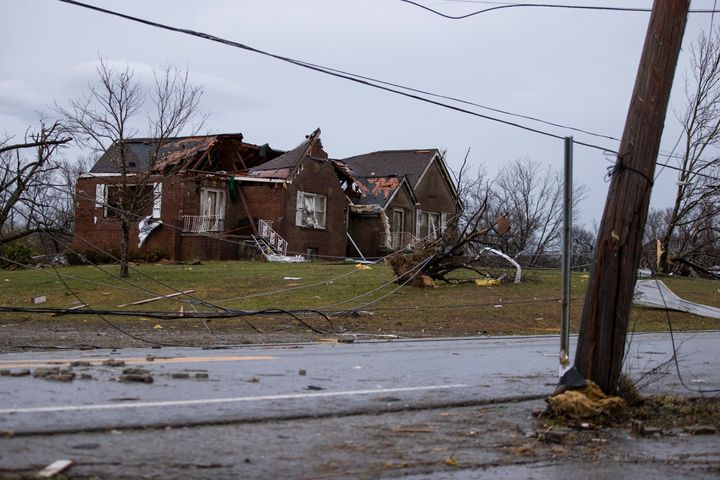 A home is shown destroyed by high winds from one of several tornadoes that tore through Tennessee overnight, killing at least 22 people.