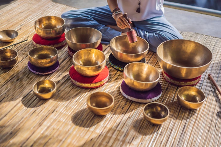 Tibetan singing bowls may be one of the sound methods used in a sound bath class.