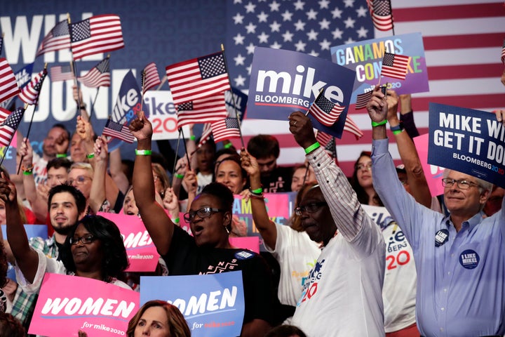 Supporters of Democratic presidential candidate Mike Bloomberg attend a primary election night campaign rally Tuesday in West Palm Beach, Fla.