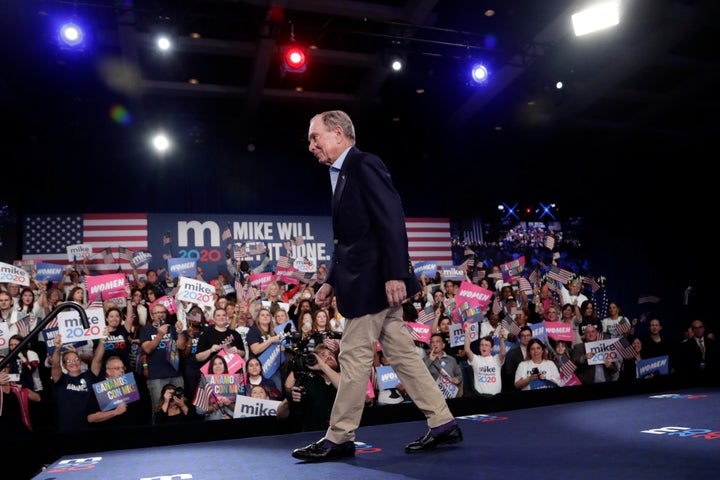 Former New York City Mayor Mike Bloomberg walks off stage after speaking during a rally Tuesday in West Palm Beach, Florida.