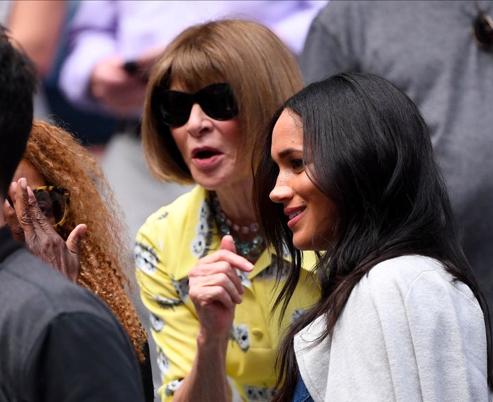 Meghan Markle talks with Anna Wintour before the women's singles final match between Serena Williams and Bianca Andreescu on Sept. 7, 2019, at the U.S. Open.