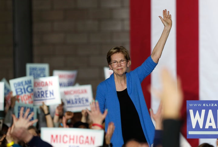 Sen. Elizabeth Warren (D-Mass.) waves to supporters at her Super Tuesday rally in Detroit.
