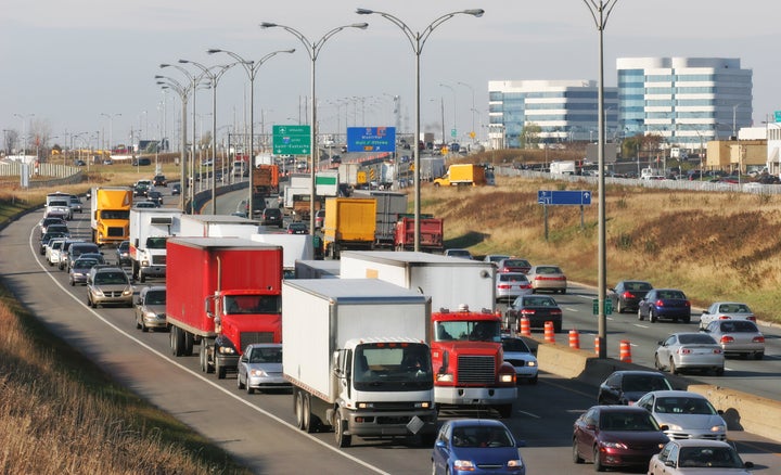 In this stock photo, traffic is seen on Autoroute 40 in Montreal. Canadian manufacturing expanded in February, despite a viral outbreak and protests that shut down critical infrastructure.