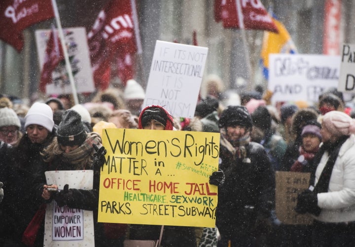 Demonstrators make their way to Queen's Park during the Toronto Women's March on Jan. 19, 2019.