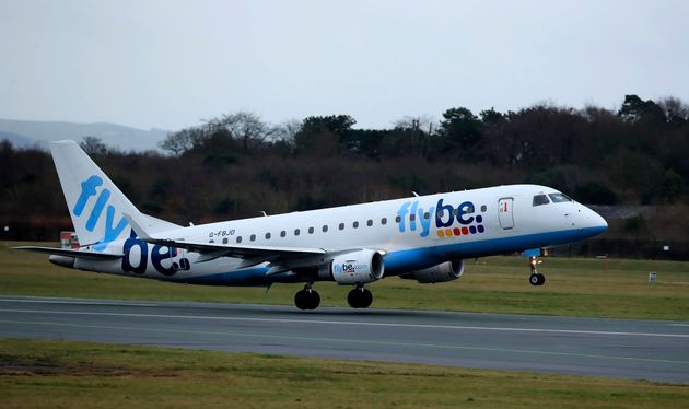 A Flybe flight departs from Manchester Airport