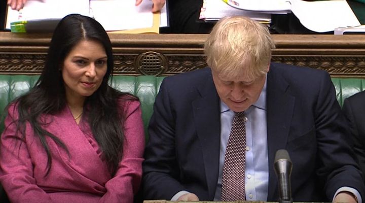Home Secretary Priti Patel and Prime Minister Boris Johnson during Prime Minister's Questions in the House of Commons.