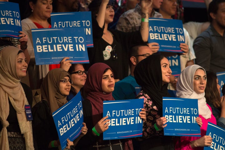 Muslim woman support Democratic presidential candidate Bernie Sanders during a 2016 campaign rally in Riverside, California.