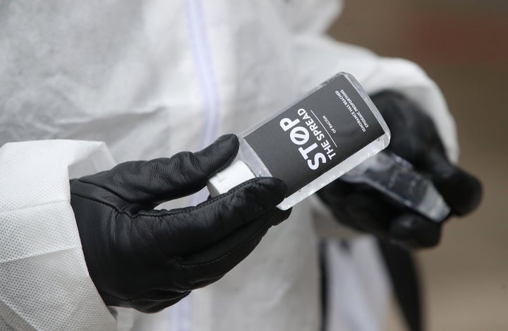 The Chinese Canadian National Council for Social Justice hands out hand sanitizer in Toronto on March 3, 2020. 
