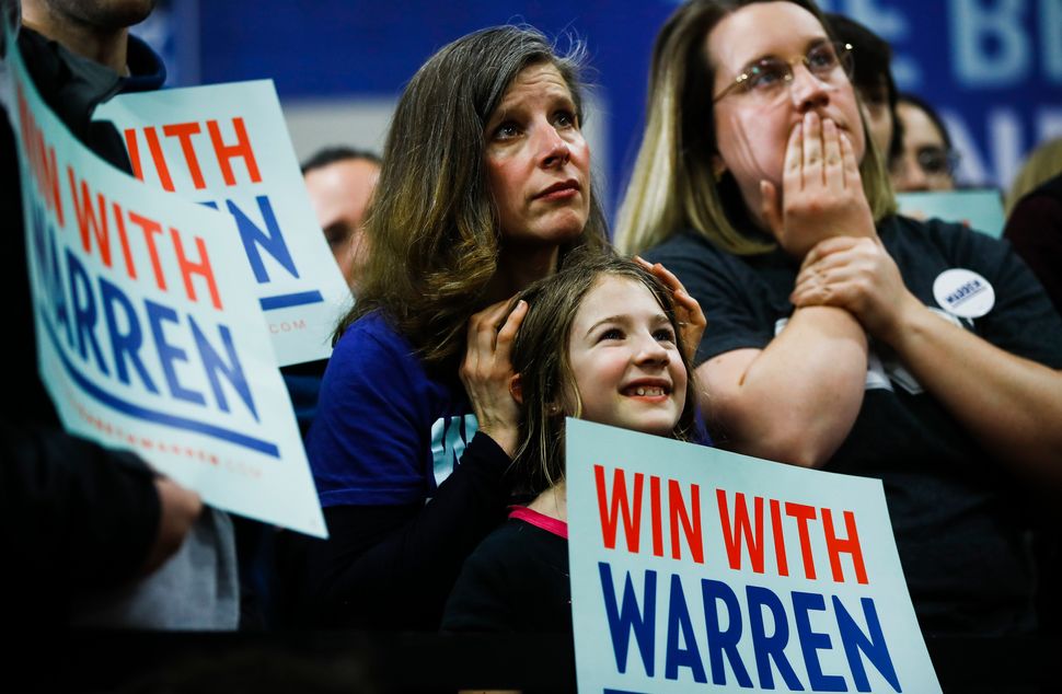 Attendees listened to Warren speak during a Feb. 9 campaign event at Rundlett Middle School in Concord, New Hampshire.