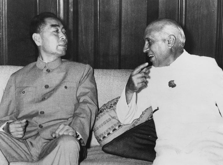 Zhou Enlai, then Premier of the People's Republic of China, with then Indian Prime Minister Jawaharlal Nehru during a visit to India, 21st April 1960.