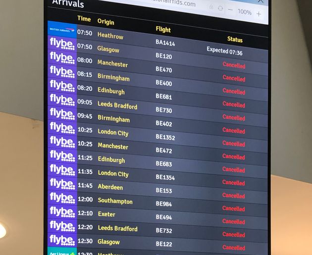 The flight departure boards showing cancelled flights at Belfast Airport as Flybe, Europe's biggest regional airline, has collapsed into administration.