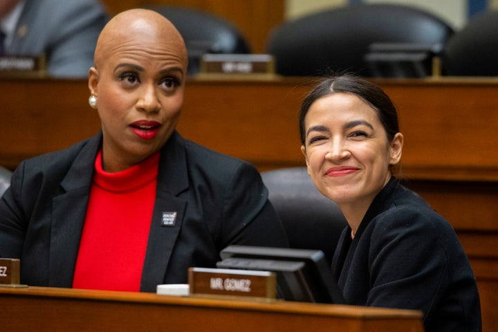 Reps. Ayanna Pressley (D-Mass.) and Alexandria Ocasio-Cortez (D-N.Y.) at a hearing on Capitol Hill on Feb. 12.