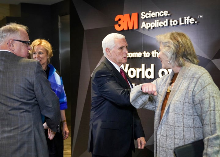 As Vice President Mike Pence offers a handshake at the end of their meeting, Minnesota Department of Health Commissioner Jan