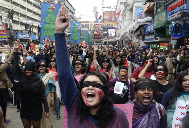 Women wear blindfolds during a demonstration to protest against violence against women in Kolkata, January 4, 2020.