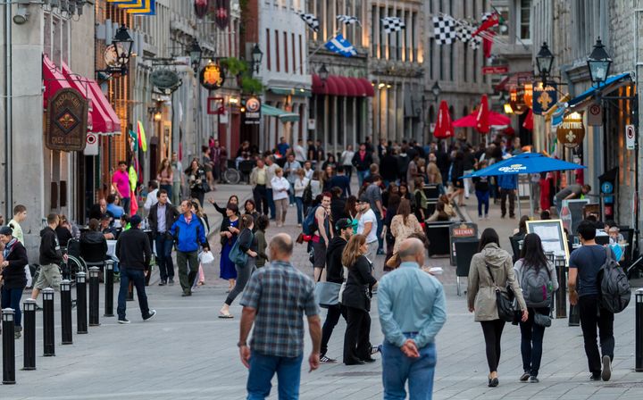In this stock photo, pedestrians walk along Saint Paul Street in Old Montreal. The province of Quebec had Canada's strongest job market in February, Statistics Canada data shows.