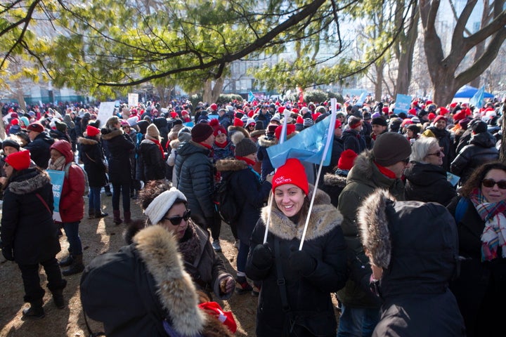 Protesters join a demonstration organized by Ontario's teacher's unions outside the Ontario legislature in Toronto on Feb. 21, 2020. 