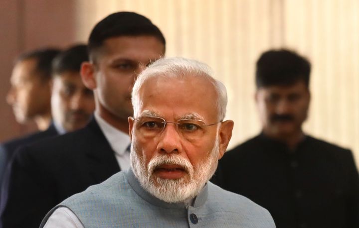 Indian Prime Minister Narendra Modi, leaves after Bharatiya Janata Party (BJP) parliamentary party meeting in New Delhi, India, Tuesday, March 3, 2020. (AP Photo/Manish Swarup)