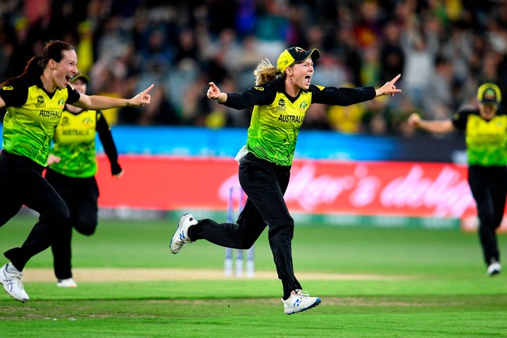 Australia's captain Meg Lanning (C) celebrates with teammates after a victory against India in the Twenty20 women's World Cup cricket final match between Australia and India in Melbourne on March 8, 2020. 