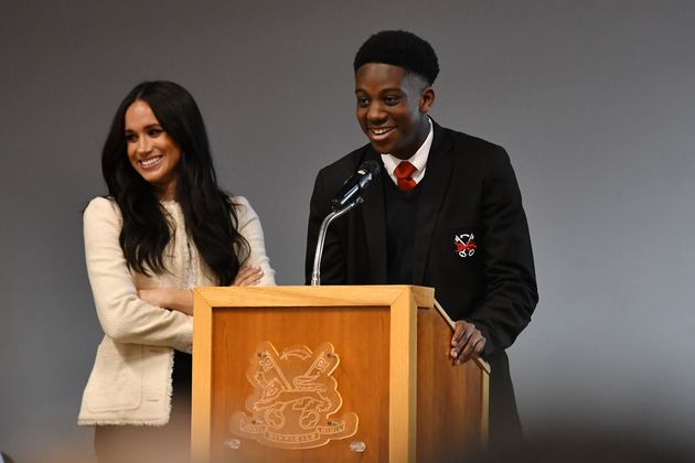 Meghan, Duchess of Sussex, smiles as student Aker Okoye speaks during a special school assembly at Robert Clack Upper School in Dagenham ahead of International Women’s Day (IWD)